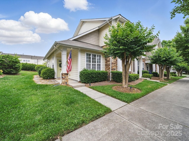 1061 Woodglen Ln, Matthews, NC 28104 - view of front of house with a front lawn and stone siding