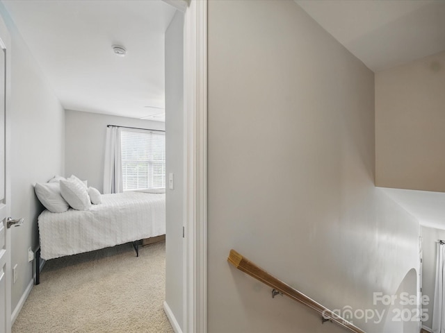 1061 Woodglen Ln, Matthews, NC 28104 - carpeted bedroom featuring baseboards