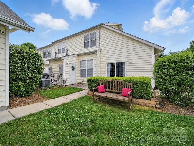 1061 Woodglen Ln, Matthews, NC 28104 - rear view of property featuring a lawn