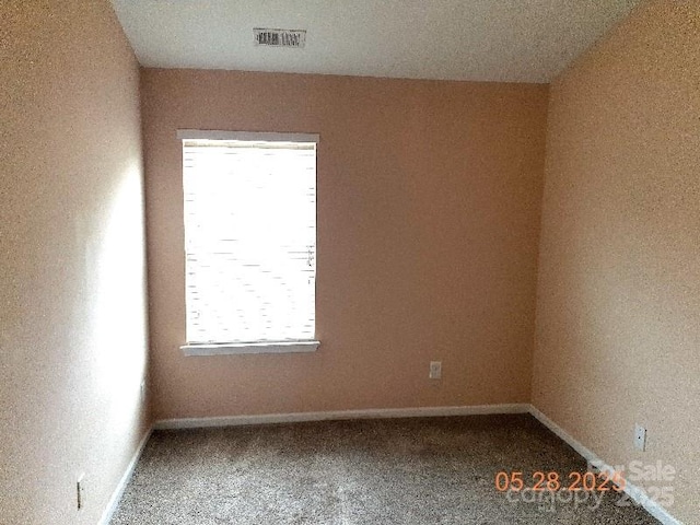 13441 Calloway Glen Dr, Charlotte, NC 28273 - spare room featuring carpet floors and baseboards