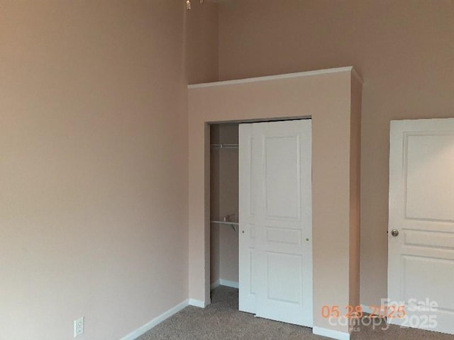 13441 Calloway Glen Dr, Charlotte, NC 28273 - unfurnished bedroom with carpet, baseboards, and a closet