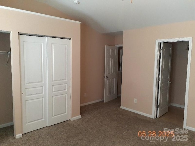 13441 Calloway Glen Dr, Charlotte, NC 28273 - unfurnished bedroom with carpet floors, baseboards, vaulted ceiling, and a closet