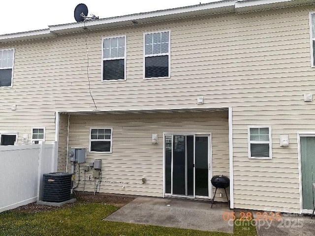 13441 Calloway Glen Dr, Charlotte, NC 28273 - rear view of house with central air condition unit and a patio area
