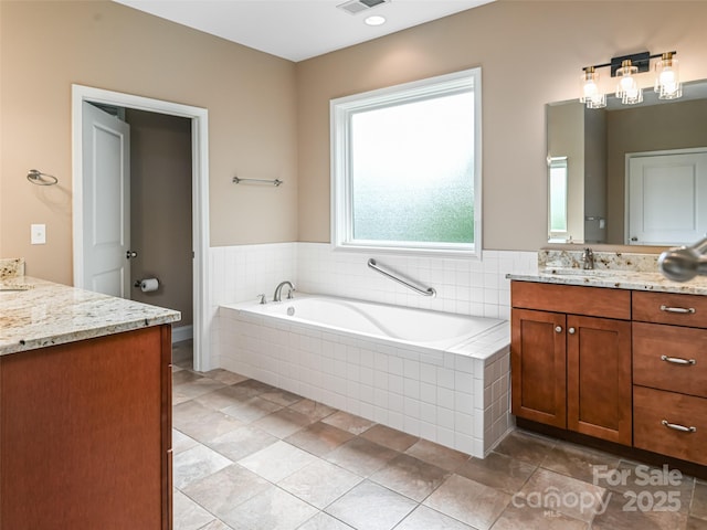 110 Village Pointe Ln, Asheville, NC 28803 - bathroom featuring vanity, a bath, and tile patterned floors