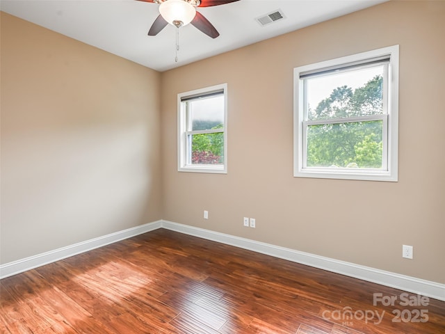 110 Village Pointe Ln, Asheville, NC 28803 - empty room featuring plenty of natural light, wood finished floors, and a ceiling fan
