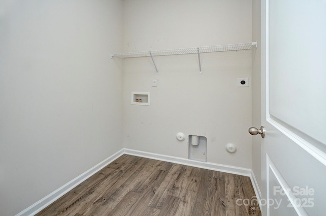 427 Carolina Hemlock Dr, Locust, NC 28097 - washroom featuring hookup for a gas dryer, washer hookup, wood finished floors, hookup for an electric dryer, and baseboards