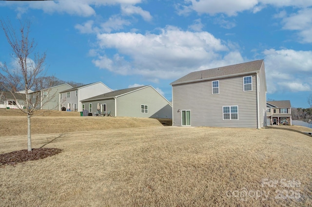 427 Carolina Hemlock Dr, Locust, NC 28097 - rear view of property with a yard and a residential view