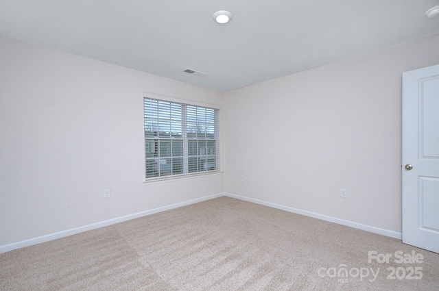 427 Carolina Hemlock Dr, Locust, NC 28097 - unfurnished room with light colored carpet, baseboards, and a smoke detector