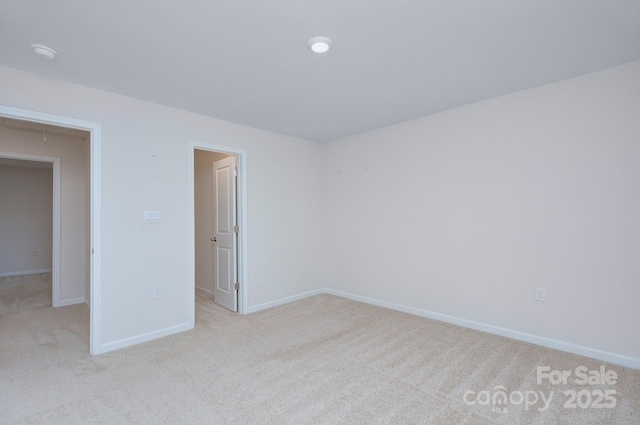 427 Carolina Hemlock Dr, Locust, NC 28097 - unfurnished bedroom with light carpet and baseboards