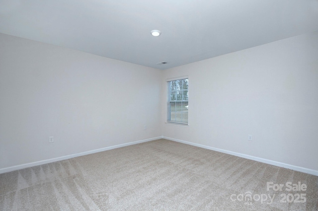 427 Carolina Hemlock Dr, Locust, NC 28097 - unfurnished room with light carpet and baseboards