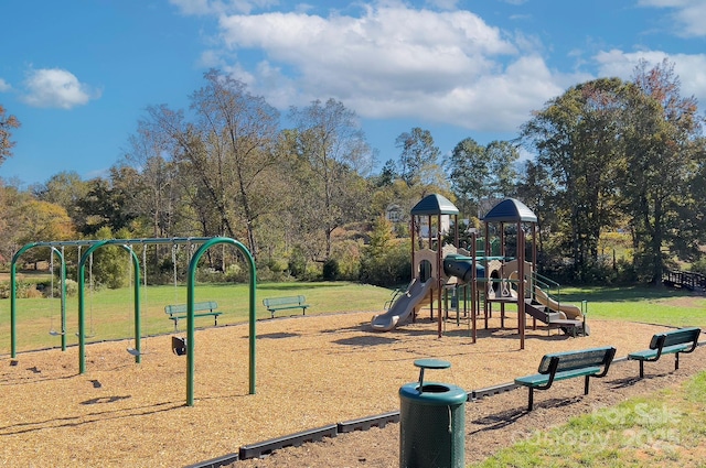 427 Carolina Hemlock Dr, Locust, NC 28097 - community play area with view of scattered trees and a yard