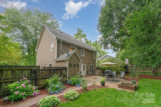 8624 Canter Post Dr, Charlotte, NC 28216 - rear view of property featuring a patio area