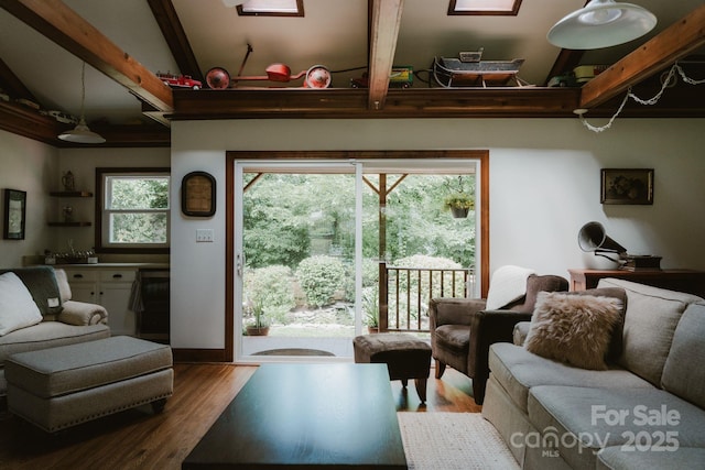 1226 Tarrington Ave, Charlotte, NC 28205 - living area featuring wood finished floors and beam ceiling