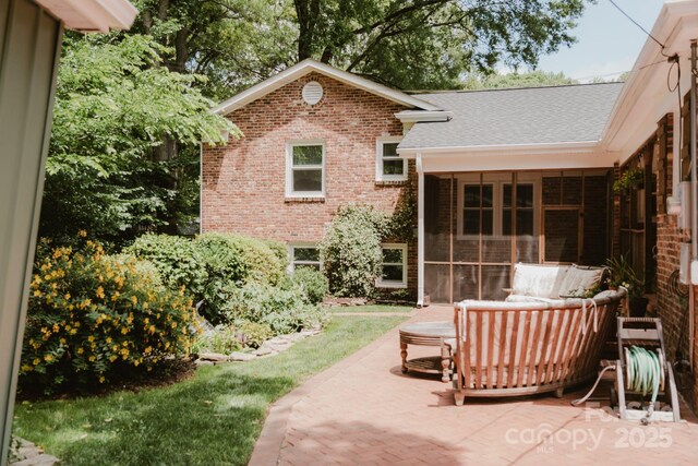 1226 Tarrington Ave, Charlotte, NC 28205 - view of patio / terrace featuring a sunroom