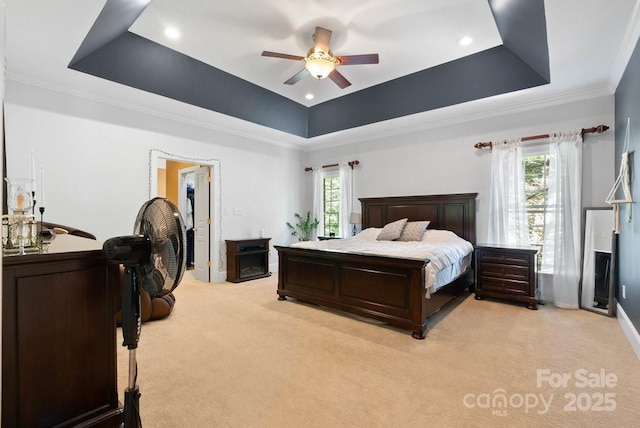 134 Brightmore Cir, Rutherfordton, NC 28139 - bedroom featuring a tray ceiling, light carpet, multiple windows, ornamental molding, and a ceiling fan