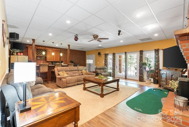 134 Brightmore Cir, Rutherfordton, NC 28139 - living area with a drop ceiling, light wood-style flooring, and a ceiling fan