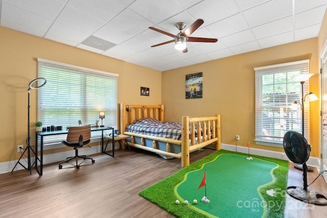 134 Brightmore Cir, Rutherfordton, NC 28139 - bedroom with wood finished floors, a paneled ceiling, and baseboards