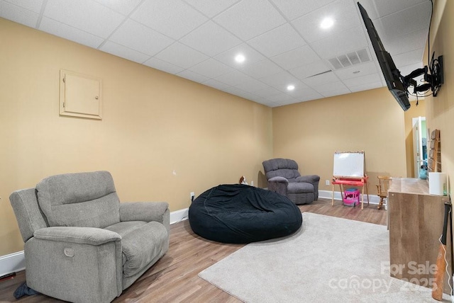 134 Brightmore Cir, Rutherfordton, NC 28139 - sitting room featuring wood finished floors, baseboards, recessed lighting, and a drop ceiling