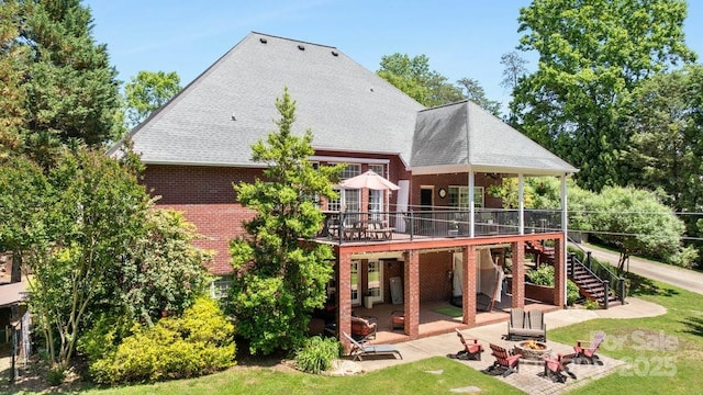 134 Brightmore Cir, Rutherfordton, NC 28139 - back of house with an outdoor fire pit, stairs, a patio area, a wooden deck, and brick siding