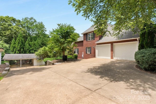 134 Brightmore Cir, Rutherfordton, NC 28139 - view of front of home featuring brick siding, concrete driveway, a shingled roof, and an attached garage