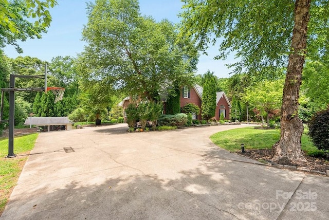 134 Brightmore Cir, Rutherfordton, NC 28139 - view of front of house with curved driveway and a front lawn