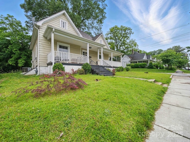 211 S Rowan Ave, Spencer, NC 28159 - view of front of house with covered porch and a front yard