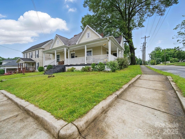 211 S Rowan Ave, Spencer, NC 28159 - view of front of home with a front yard and covered porch