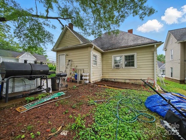 211 S Rowan Ave, Spencer, NC 28159 - back of house featuring a chimney and cooling unit