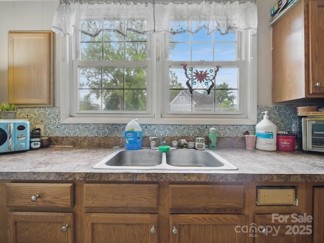 211 S Rowan Ave, Spencer, NC 28159 - kitchen with a sink and healthy amount of natural light