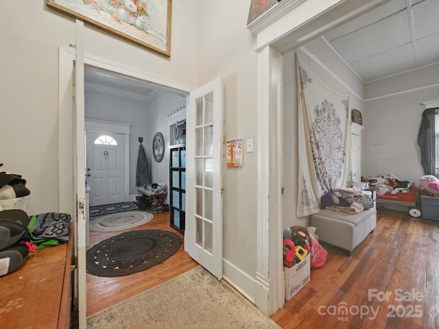 211 S Rowan Ave, Spencer, NC 28159 - foyer entrance featuring wood finished floors, french doors, and crown molding
