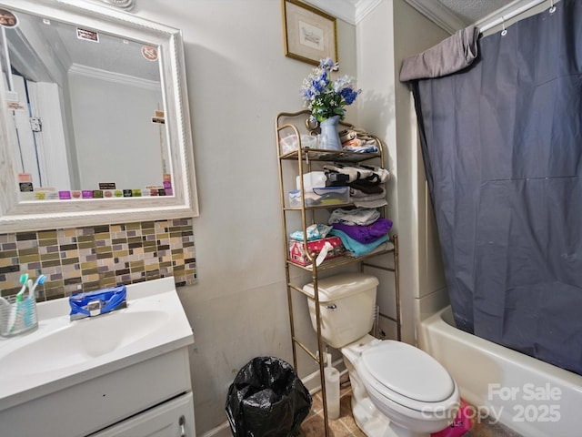 211 S Rowan Ave, Spencer, NC 28159 - bathroom with ornamental molding, vanity, toilet, shower / bath combo with shower curtain, and tasteful backsplash