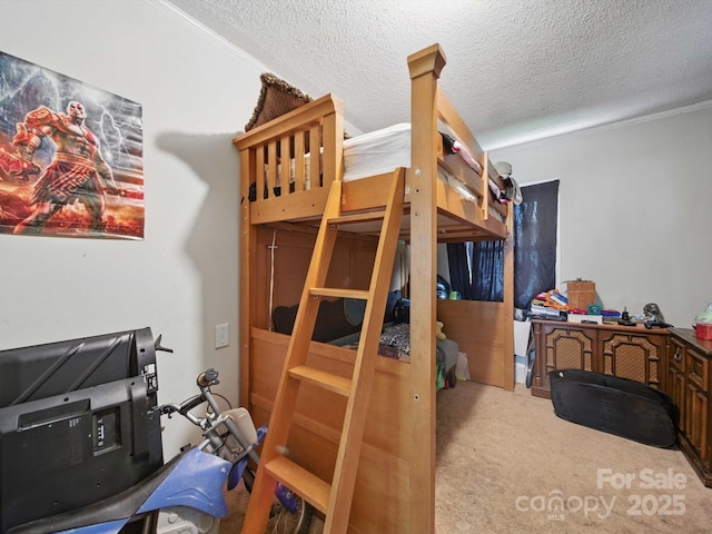 211 S Rowan Ave, Spencer, NC 28159 - carpeted bedroom with ornamental molding and a textured ceiling
