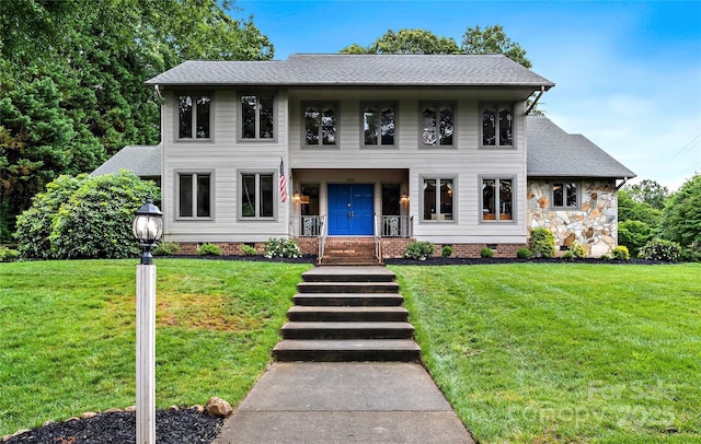 1201 Cliffspring Ct, Winston Salem, NC 27104 - colonial house with a porch, a front yard, a shingled roof, and crawl space
