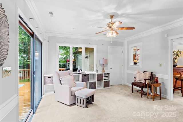 1201 Cliffspring Ct, Winston Salem, NC 27104 - living area featuring plenty of natural light, carpet, crown molding, and a ceiling fan