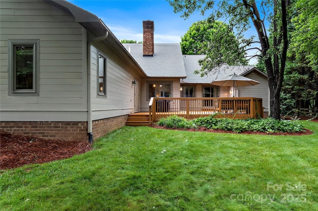 1201 Cliffspring Ct, Winston Salem, NC 27104 - back of property featuring a deck, a chimney, and a lawn