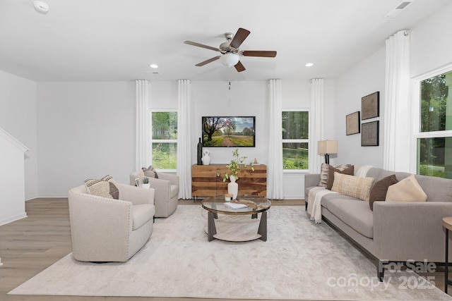1815 Wildwood Dr, Charlotte, NC 28214 - living area featuring wood finished floors, ceiling fan, recessed lighting, and baseboards