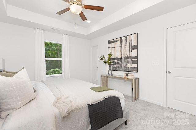 1815 Wildwood Dr, Charlotte, NC 28214 - bedroom featuring a tray ceiling, carpet floors, recessed lighting, baseboards, and ceiling fan
