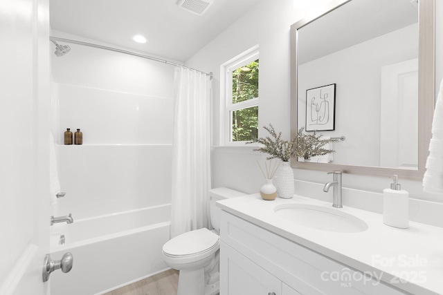1815 Wildwood Dr, Charlotte, NC 28214 - full bath with vanity, toilet, shower / bathtub combination with curtain, and wood finished floors