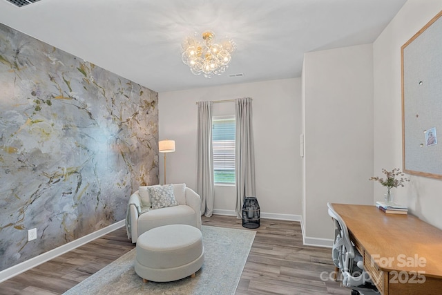 1344 Sweet Pea St, Monroe, NC 28110 - living area featuring a chandelier, wood finished floors, baseboards, and an office area