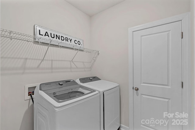 1344 Sweet Pea St, Monroe, NC 28110 - laundry area featuring washer and dryer and baseboards