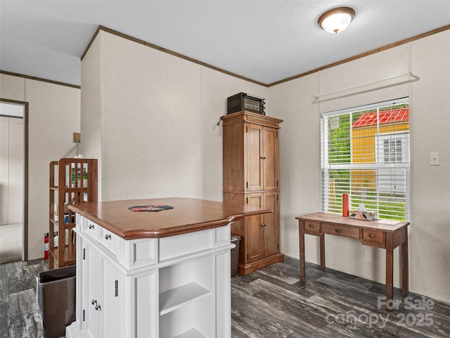 38 Kemp Rd, Pisgah Forest, NC 28768 - kitchen with dark wood finished floors, ornamental molding, open shelves, and white cabinets
