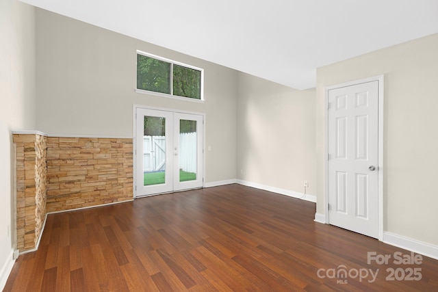 6101 Heath Ridge Ct, Charlotte, NC 28210 - spare room featuring french doors, wood finished floors, and baseboards