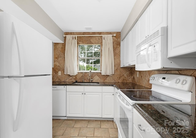 6101 Heath Ridge Ct, Charlotte, NC 28210 - kitchen with white appliances, a sink, white cabinetry, and decorative backsplash