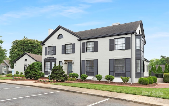 6101 Heath Ridge Ct, Charlotte, NC 28210 - view of front of property featuring a chimney, uncovered parking, and a shingled roof