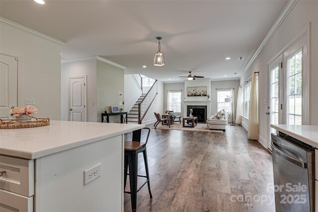 360 Sundown Rd, Mooresville, NC 28117 - kitchen featuring a fireplace, dishwasher, ceiling fan, recessed lighting, and light wood finished floors