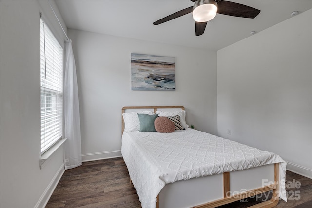 360 Sundown Rd, Mooresville, NC 28117 - bedroom featuring multiple windows, wood finished floors, and baseboards