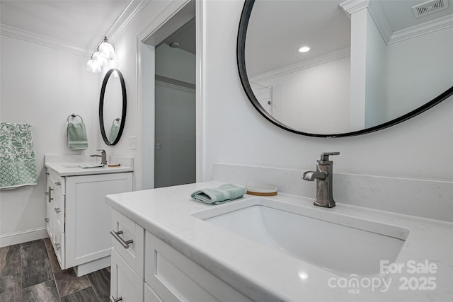 360 Sundown Rd, Mooresville, NC 28117 - bathroom with ornamental molding, two vanities, and recessed lighting