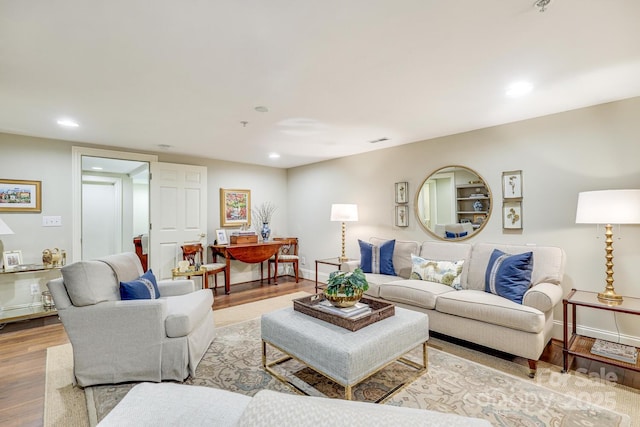 525 Queens Rd, Charlotte, NC 28207 - living area featuring wood finished floors, recessed lighting, and baseboards