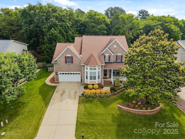 10703 Back Ridge Rd, Charlotte, NC 28277 - traditional-style home with a garage, driveway, and a front yard