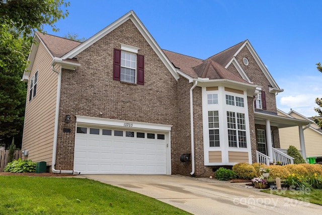 10703 Back Ridge Rd, Charlotte, NC 28277 - traditional-style house with an attached garage, brick siding, and driveway